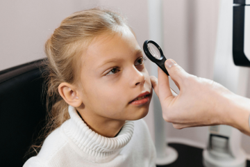 Child undergoing an eye examination