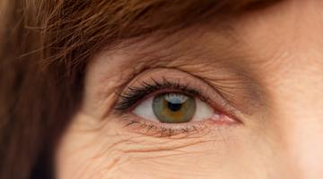 A close up of a mature woman's eye