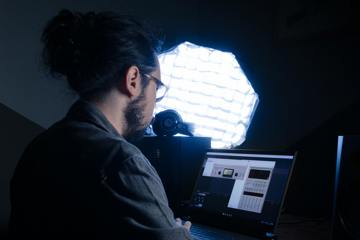 Researcher looking at a computer screen