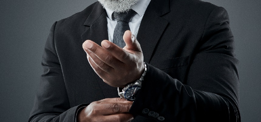 A mature man in a suite